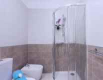 wall, sink, plumbing fixture, indoor, bathtub, shower, tap, bathroom, bathroom accessory, room, scene, interior, design, mirror